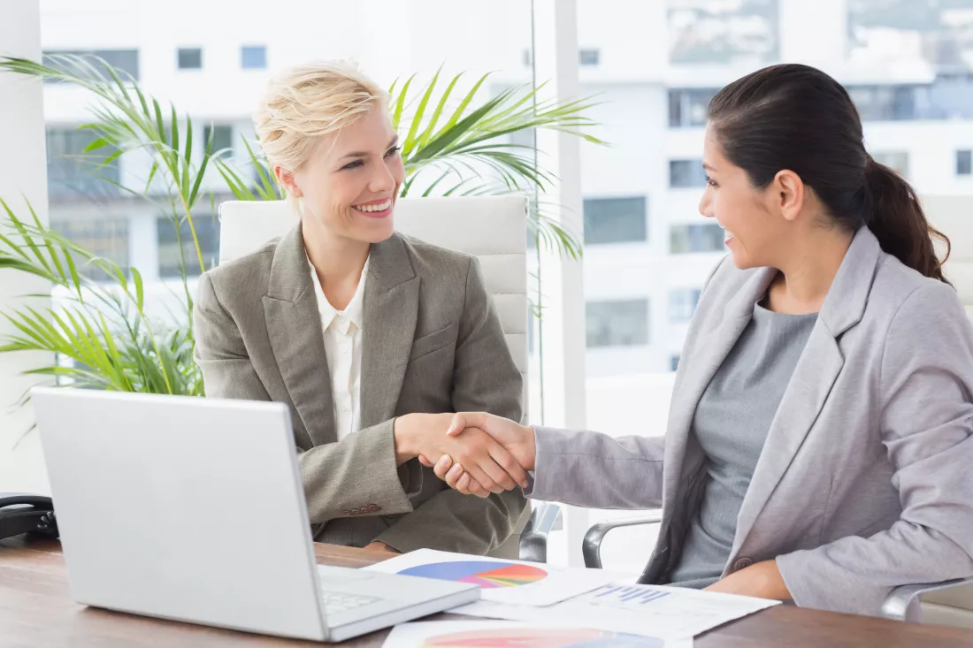 businesswomen-shaking-hands